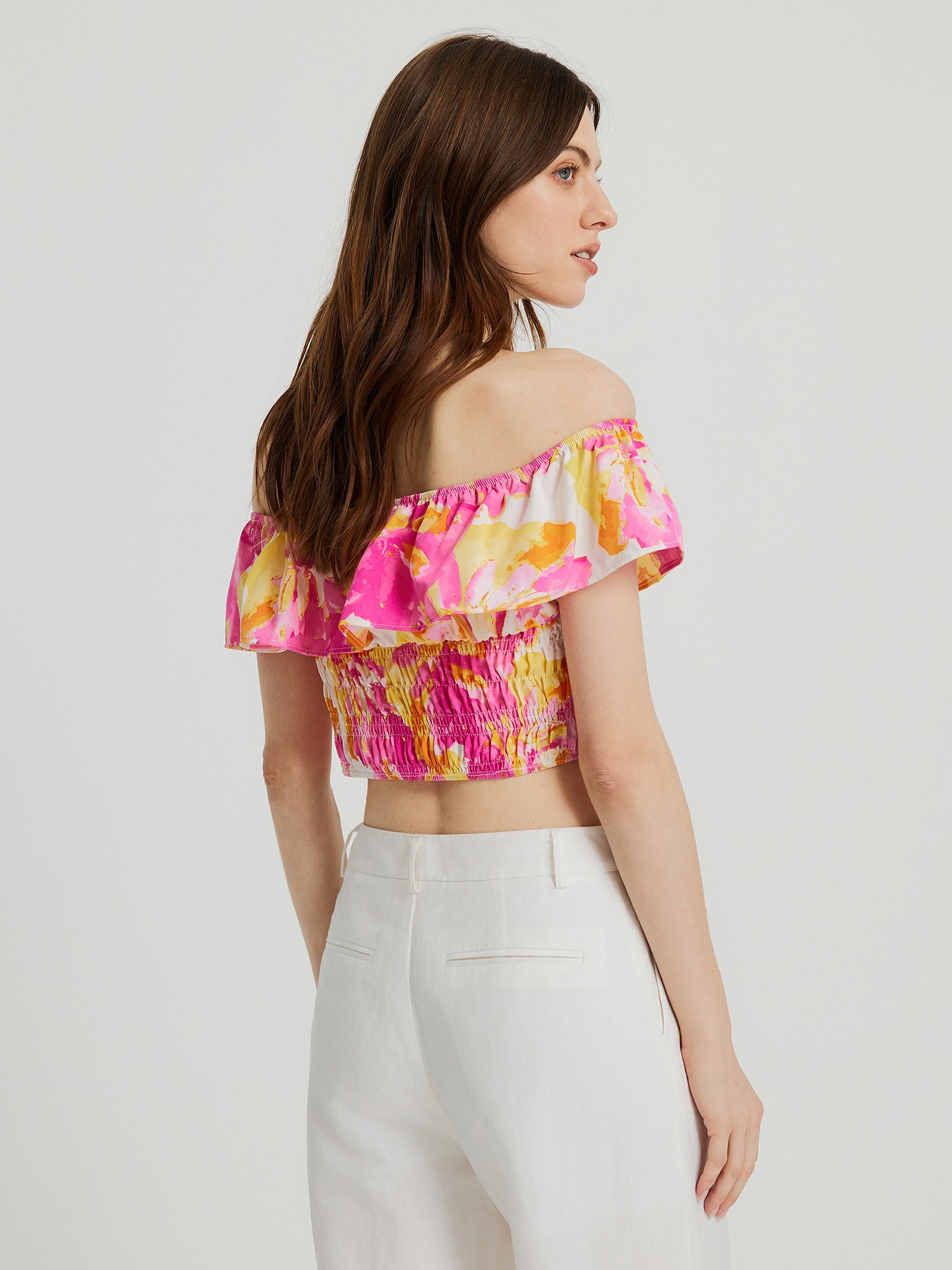 Off the shoulder store ruffle crop top