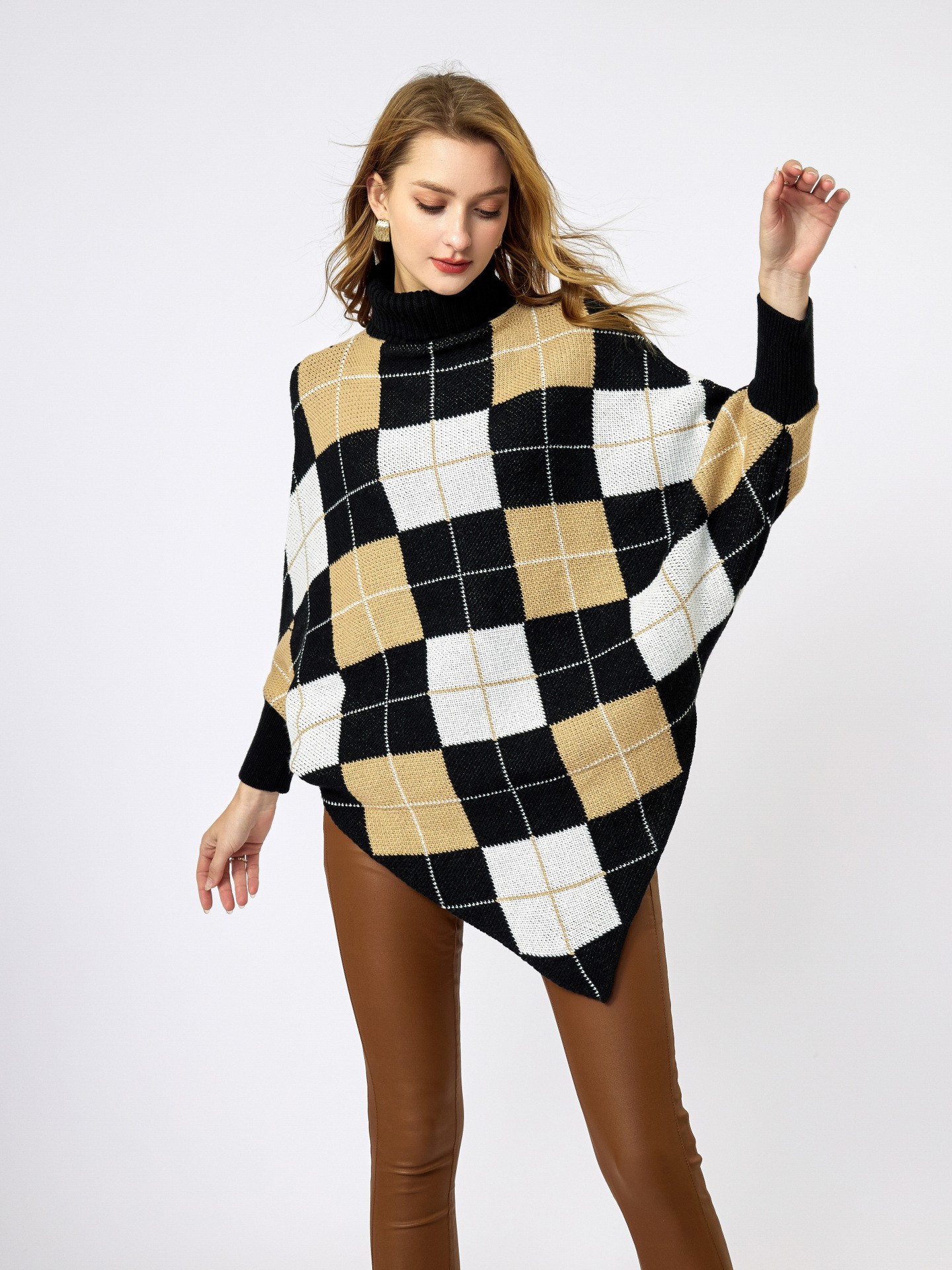 Black and on sale white poncho sweater