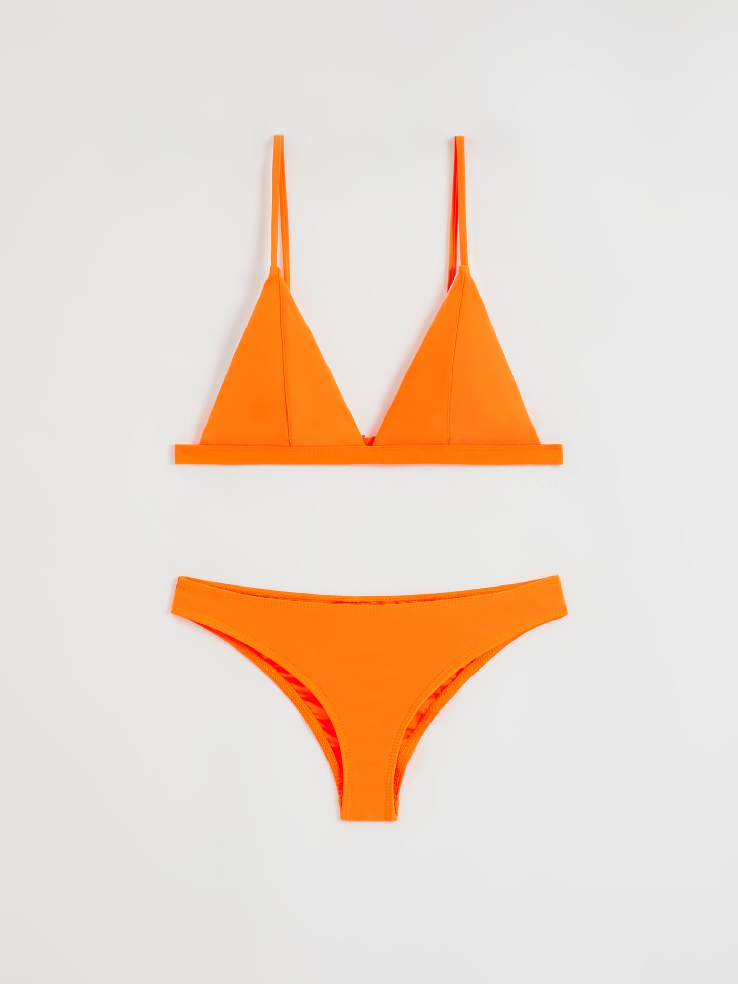 URBANIC Women Orange Solid Backless Trikinis Price in India, Full  Specifications & Offers